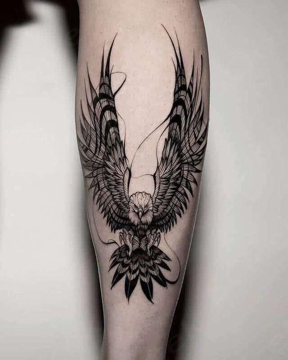 Tribal-Inspired Eagle on Forearm Tattoo Design