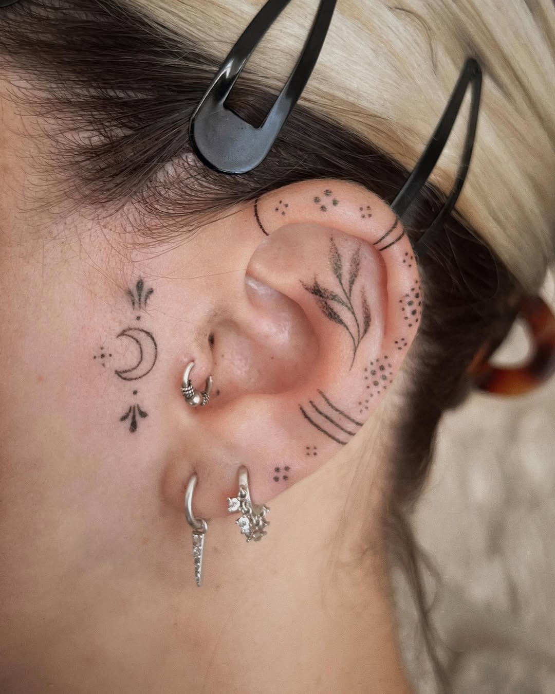 Intricate ear tattoos for a unique vibe Tattoo Design