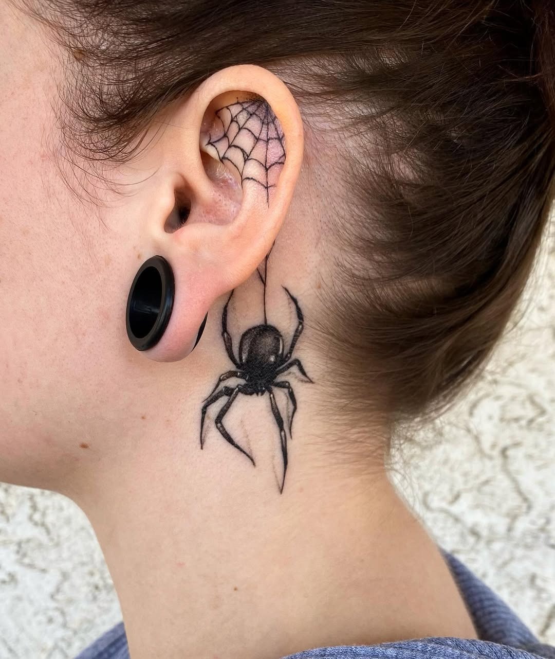 Intricate spider web tattoo behind the ear Tattoo Design
