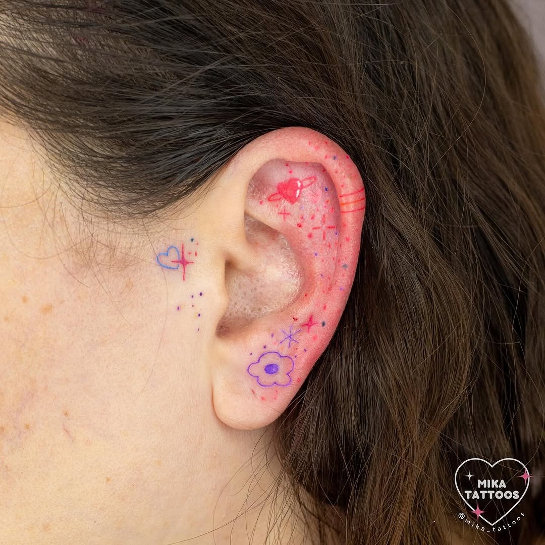 Playful ear tattoo designs in vibrant colors Tattoo Design