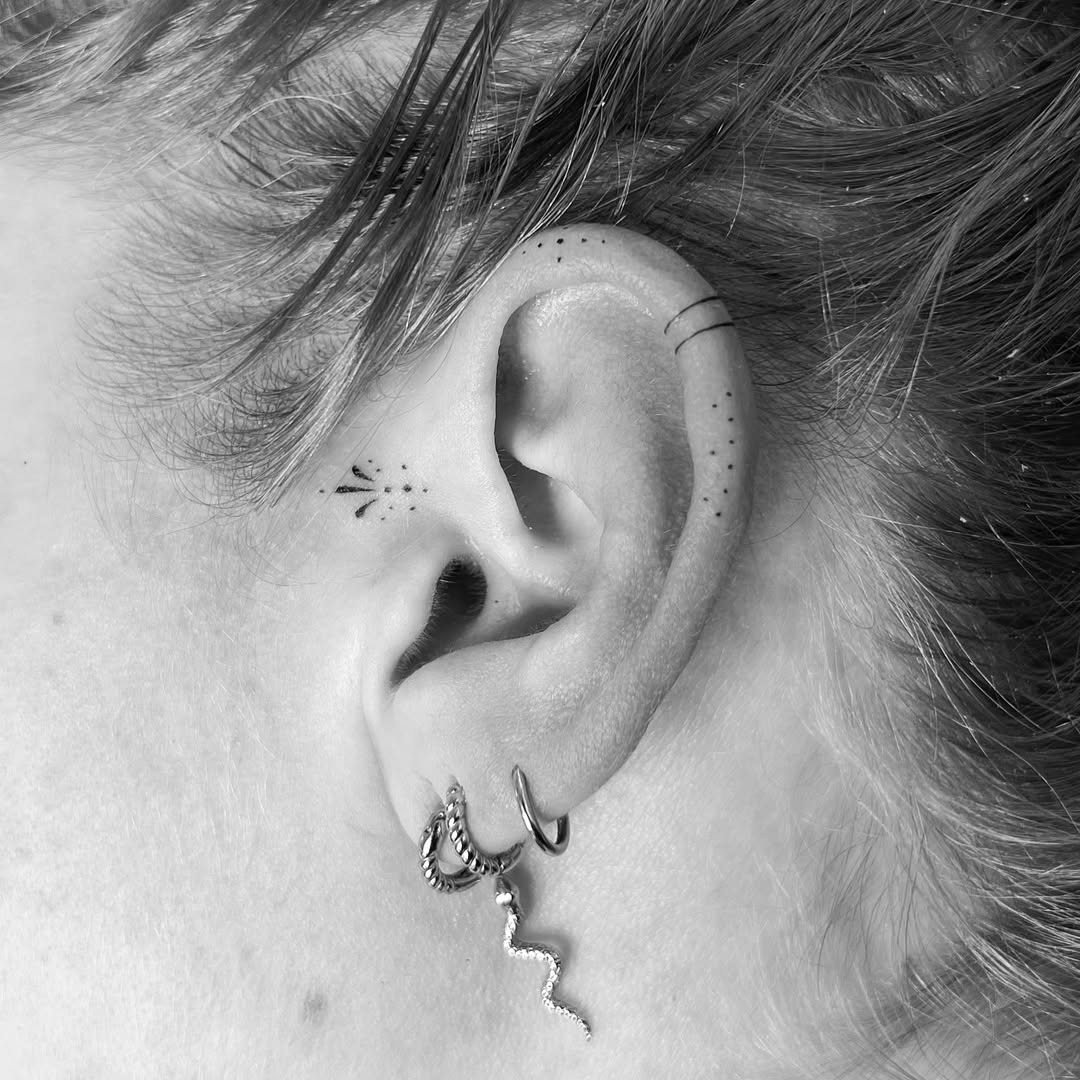Unique minimalist tattoos highlighting ear aesthetics Tattoo Design
