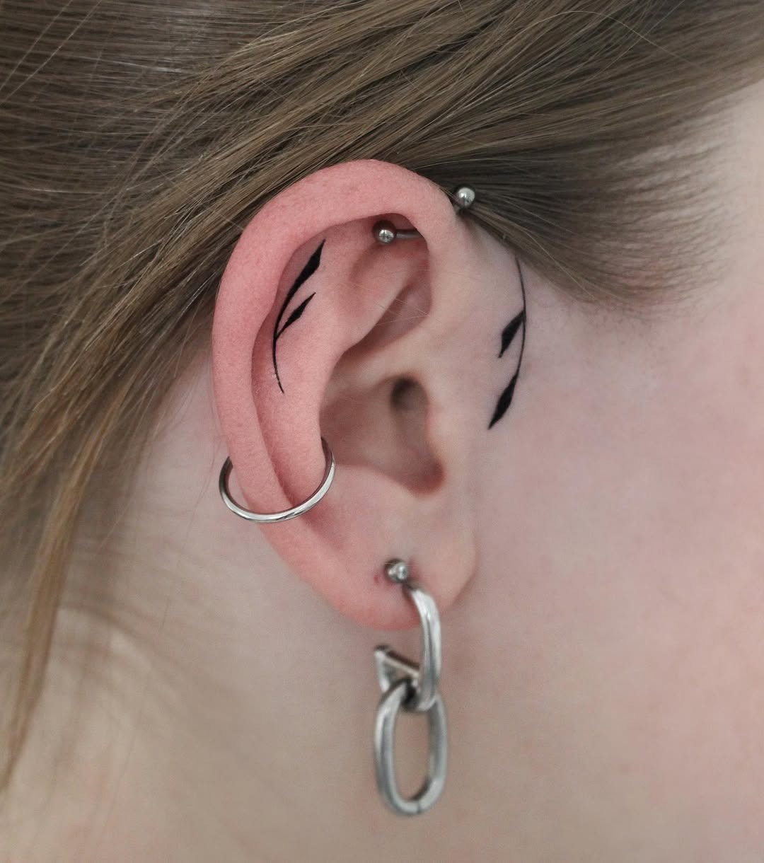Unique minimalistic ear tattoo design ideas Tattoo Design