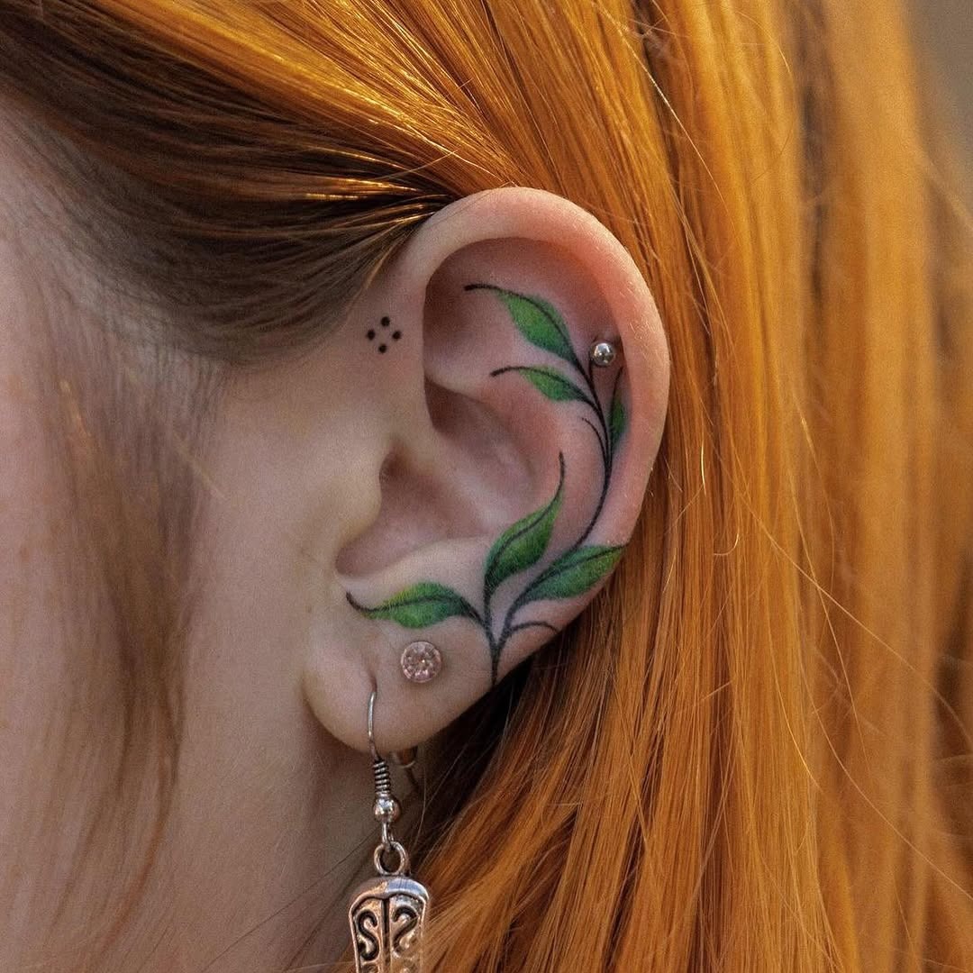 Vibrant plant tattoo adorning the ear Tattoo Design