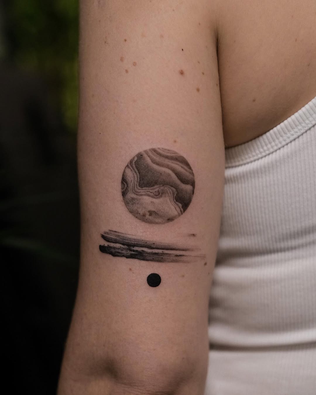 A cosmic blend of planet and minimalism. Tattoo Design