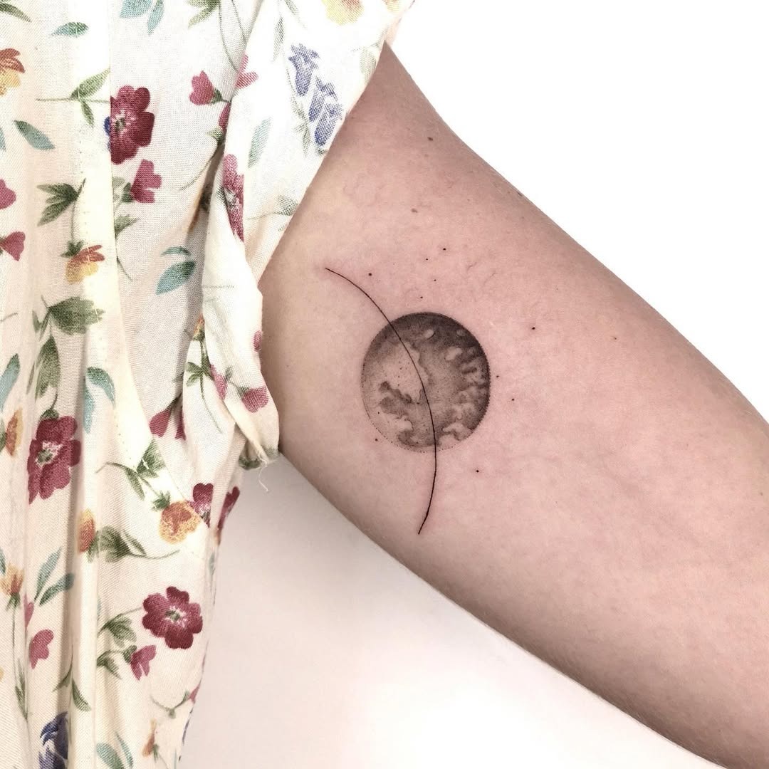 Elegant Earth Tattoo with Celestial Elements Tattoo Design