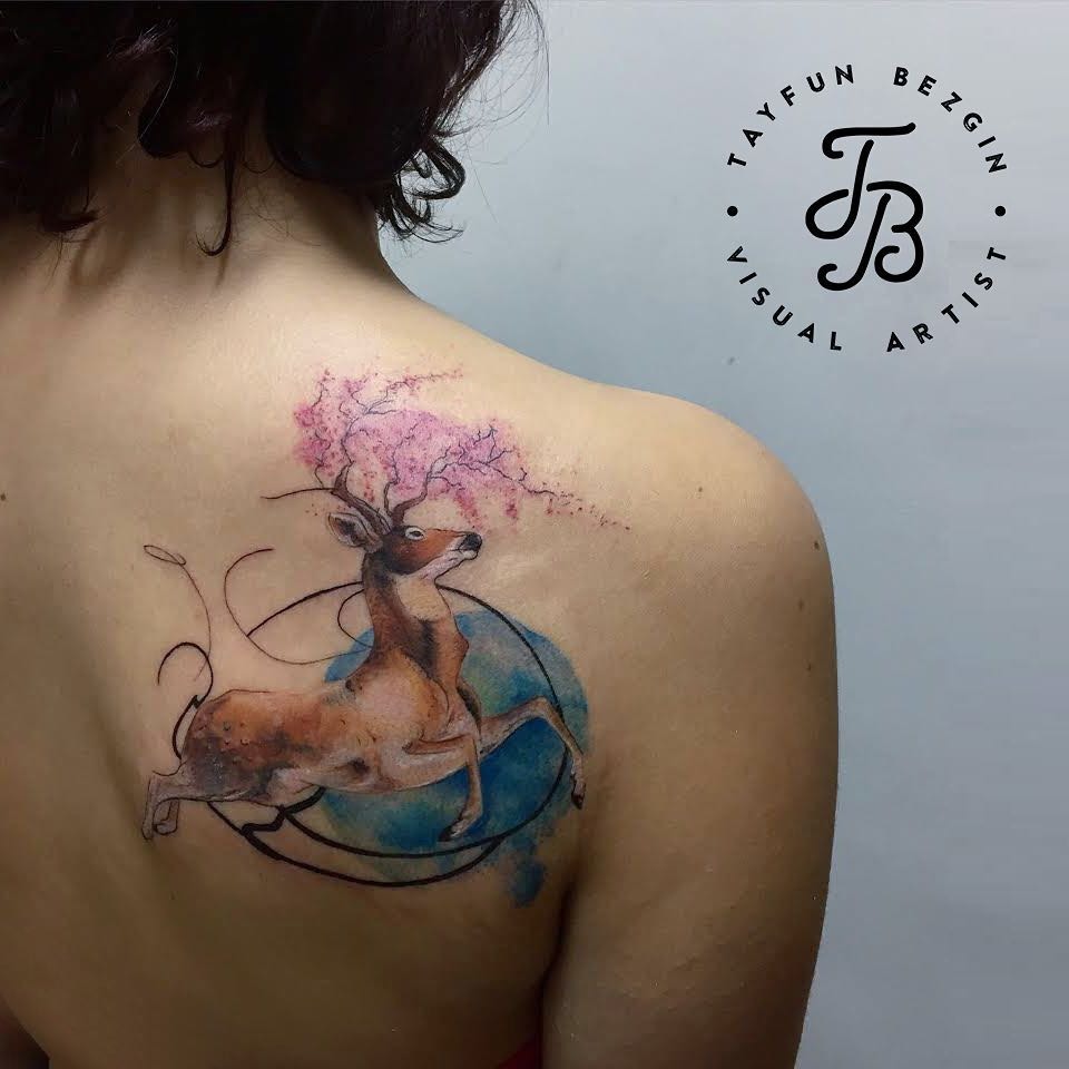 Deer with Blossoming Antlers and Earth Tattoo Tattoo Design