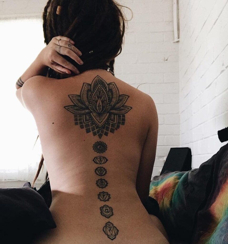 Lotus and Chakra Symbols Spine Tattoo Tattoo Design