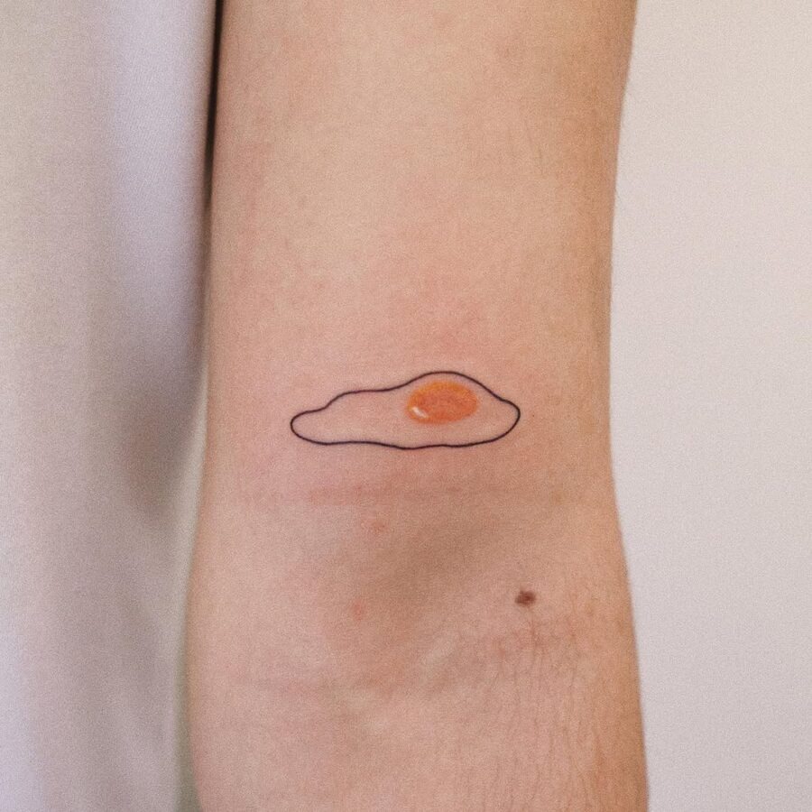 Charming and whimsical egg tattoo Artwork tattoo design