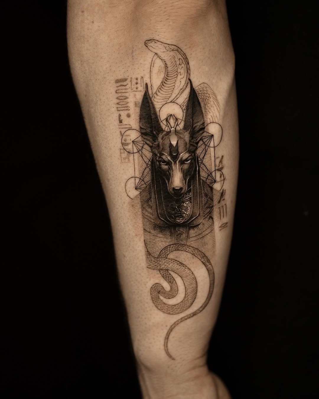 Anubis and snake: a powerful Egyptian symbol Tattoo Design