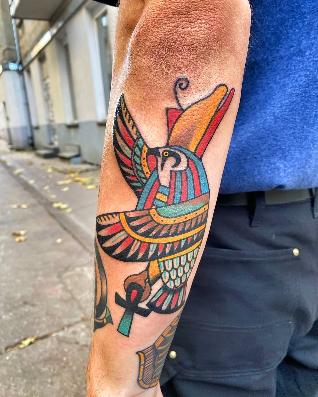 Colorful Egyptian-inspired tattoo of a bird Tattoo Design