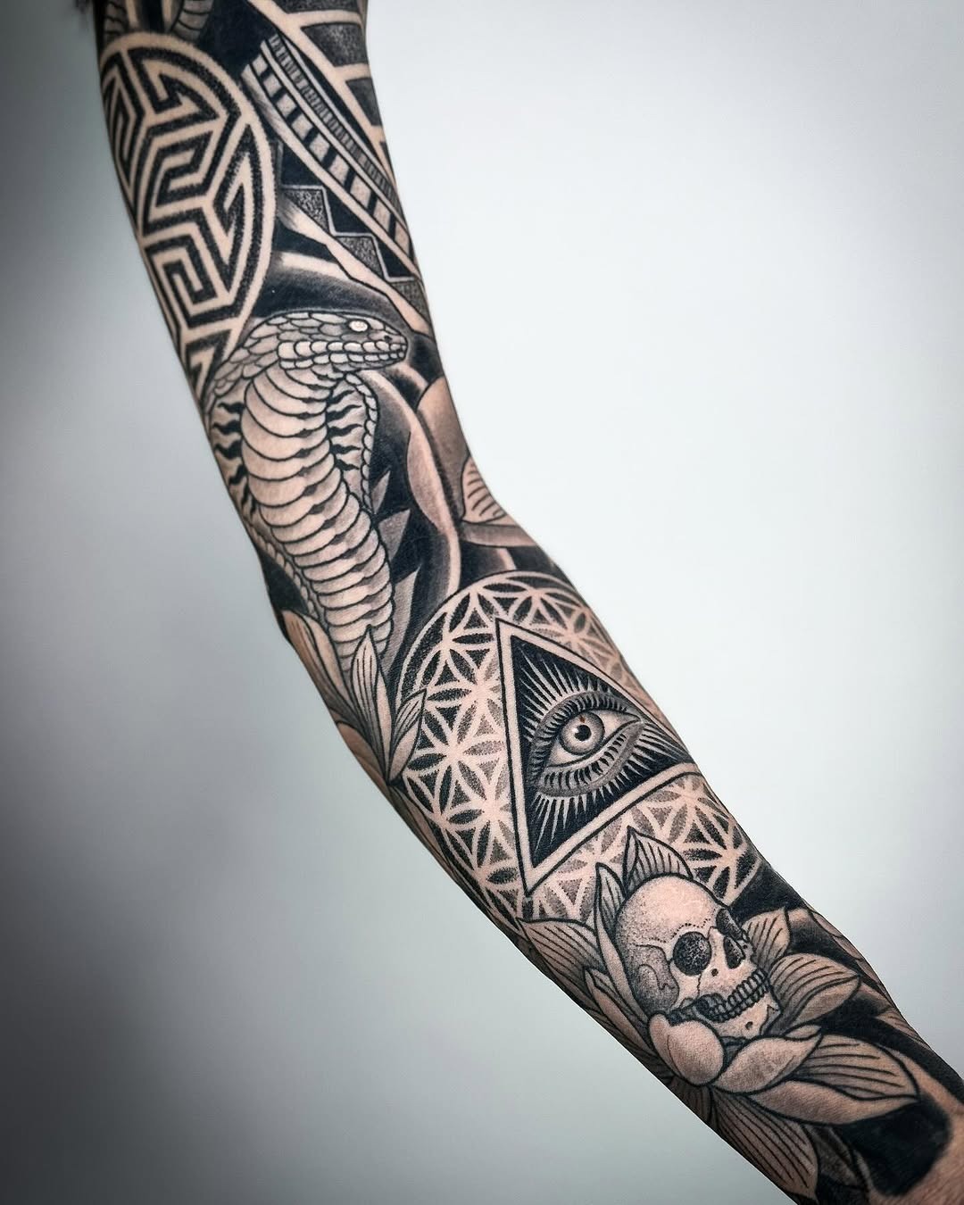Intricate Egyptian-Inspired Tattoo Sleeve Design Tattoo Design