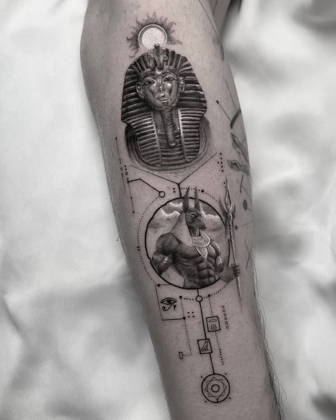 Intricate Egyptian-themed tattoo design on arm Tattoo Design