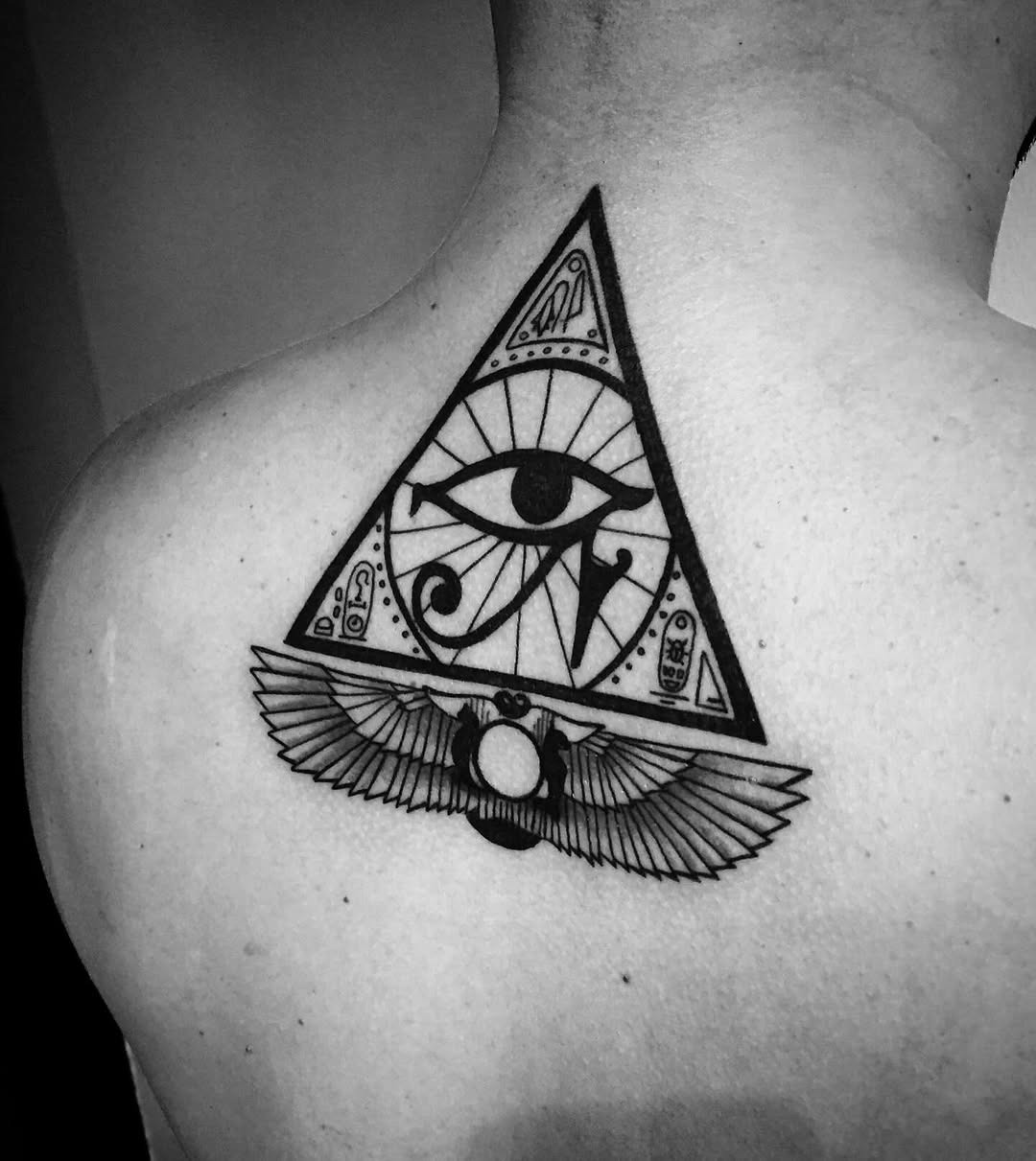 Symbolic Egyptian Eye Tattoo on Back Tattoo Design