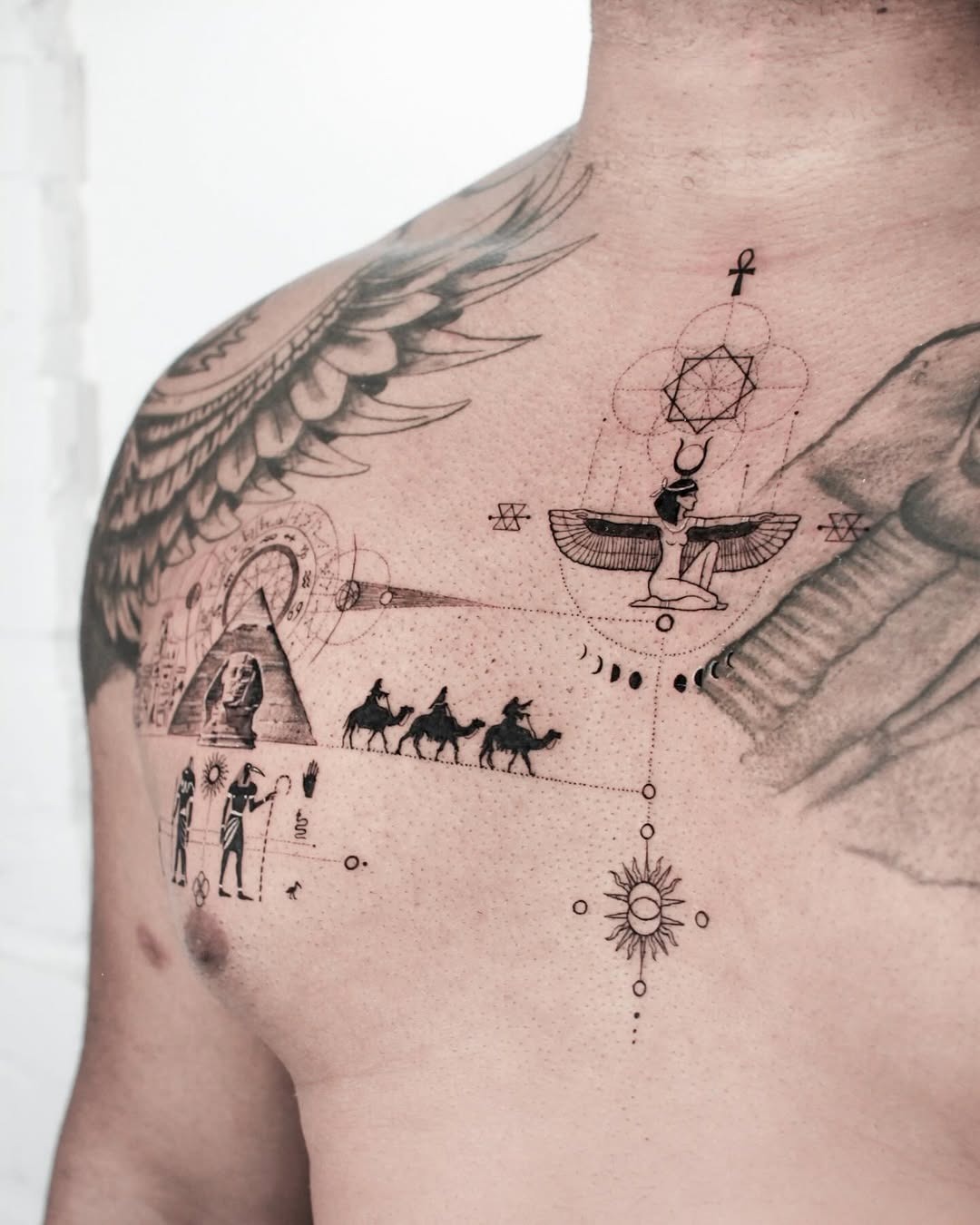 Symbolic Egyptian Tattoo with Hieroglyphs Tattoo Design