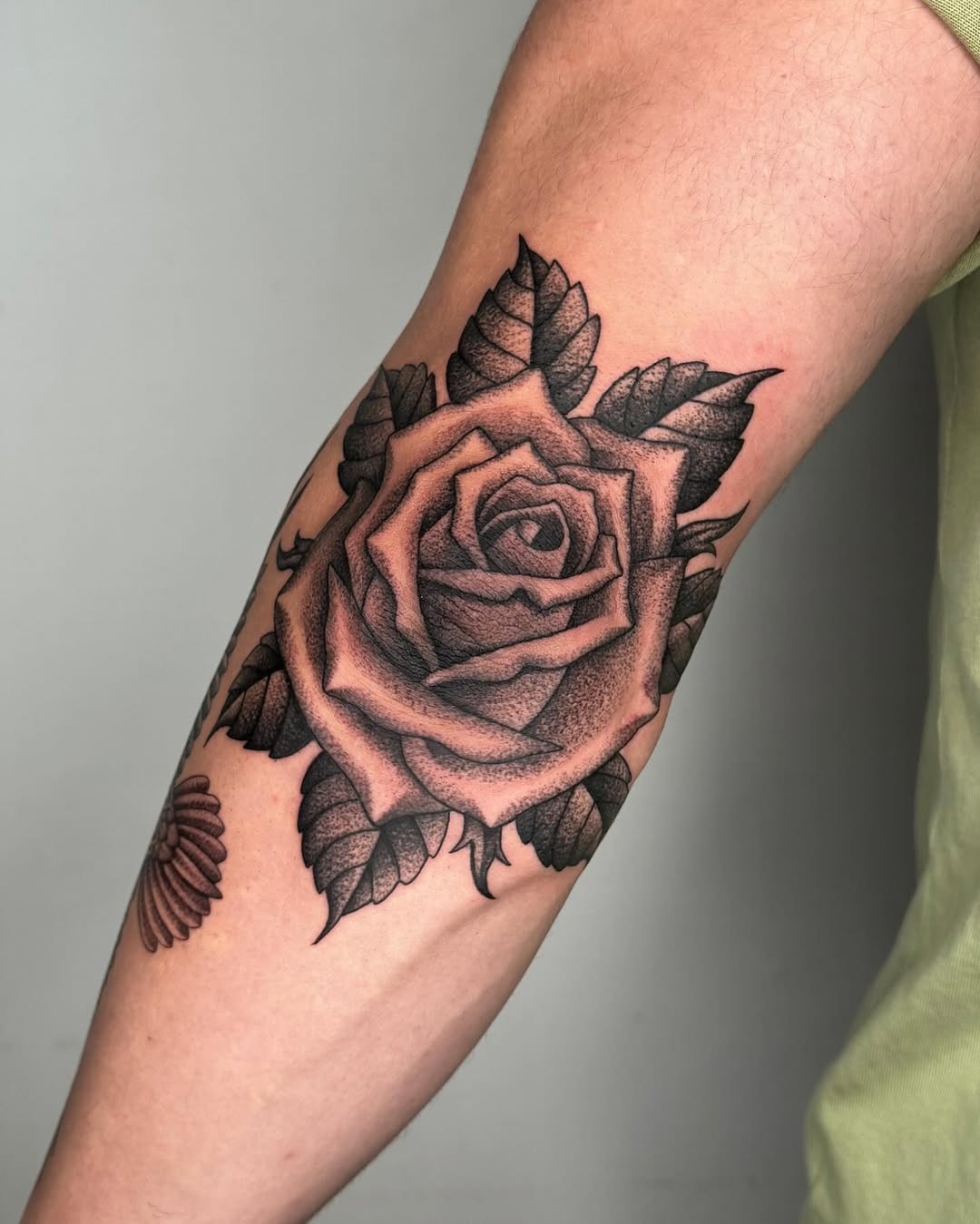 Bold Black Rose Tattoo on Elbow Tattoo Design