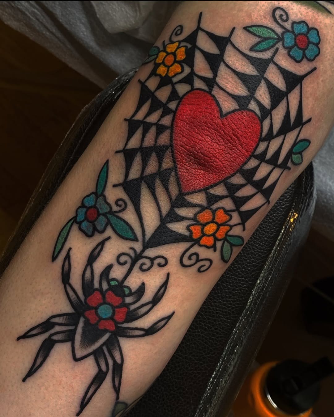 Bold spider web and heart design inspiration Tattoo Design
