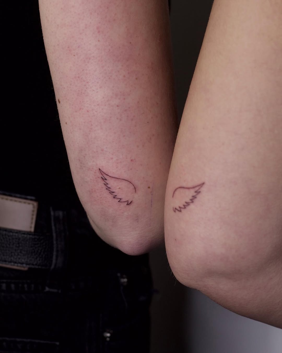 Delicate wing tattoos on the elbows Tattoo Design