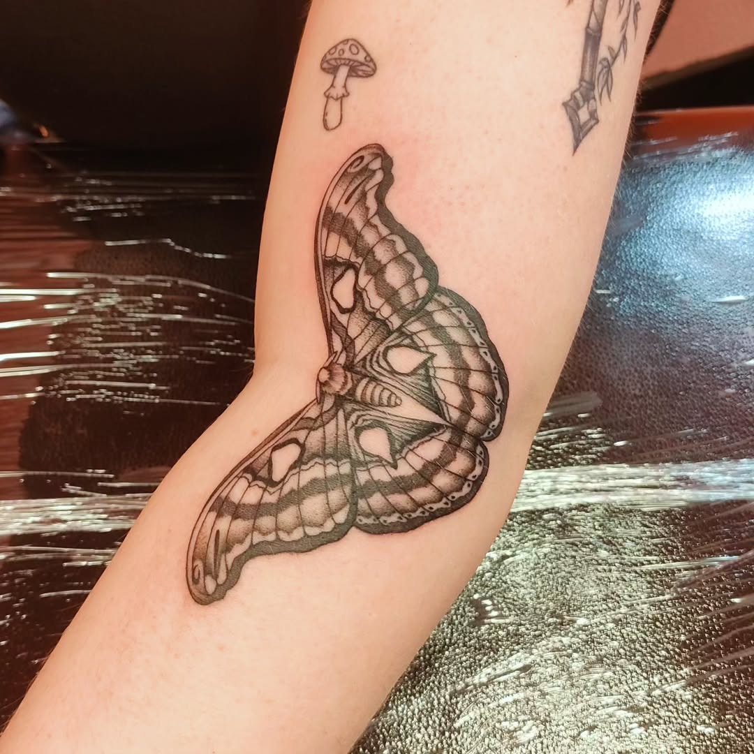 Exquisite butterfly tattoo inked on elbow Tattoo Design