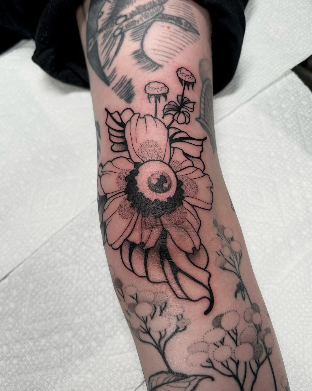 Intricate flower tattoo showcasing delicate outlines Tattoo Design