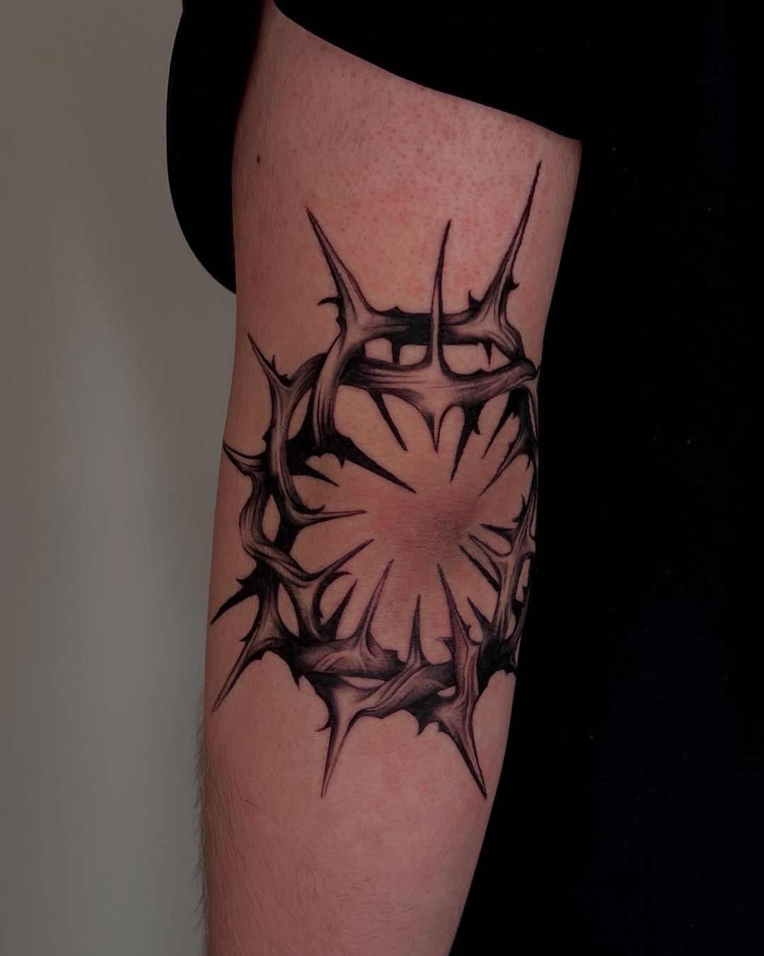 Intricate thorn design on elbow tattoo Tattoo Design