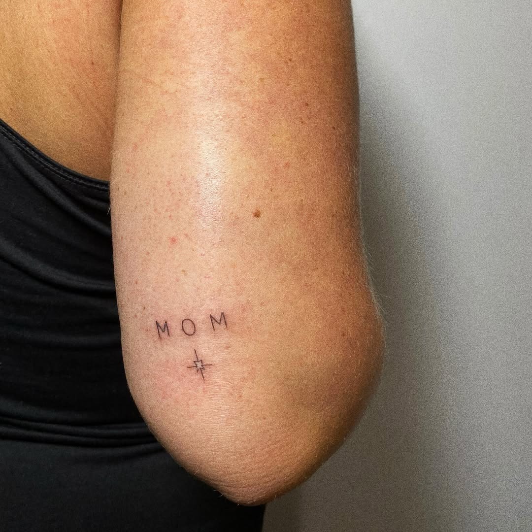 Simple yet meaningful elbow tattoo design. Tattoo Design