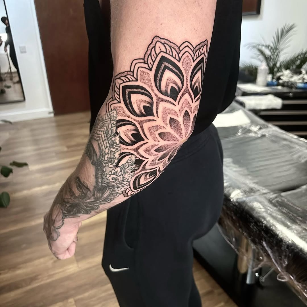 Stunning mandala elbow tattoo with intricate details Tattoo Design