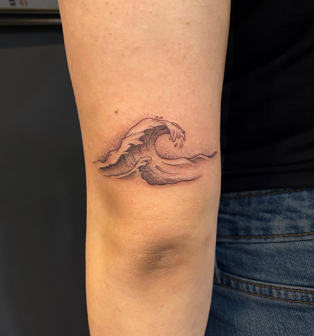 Stylish wave design on the elbow Tattoo Design