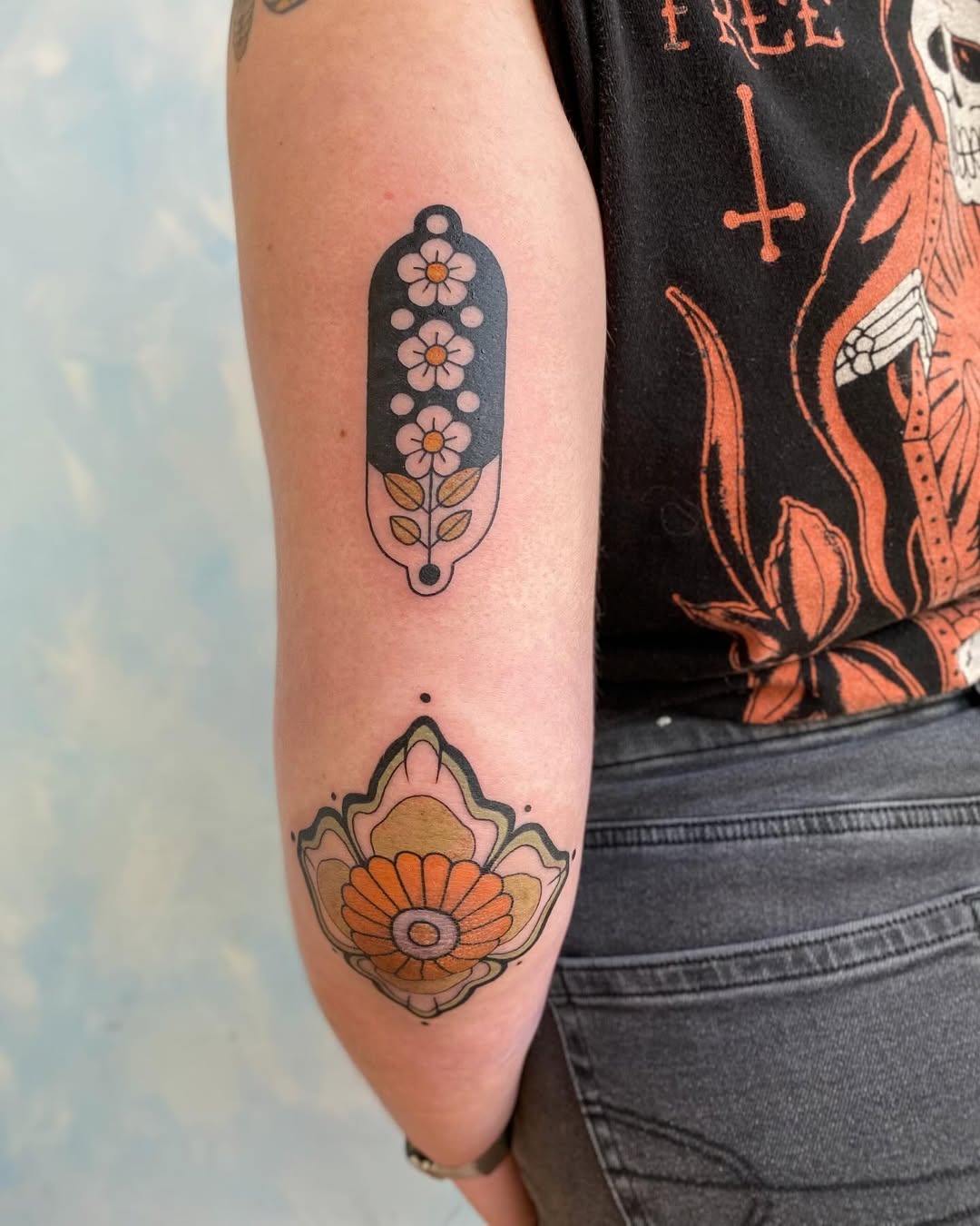 Vibrant floral elbow tattoo designs for unique aesthetics Tattoo Design
