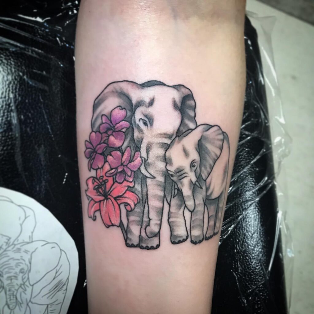 Elephant Duo with Pink Floral Accent Tattoo Tattoo Design