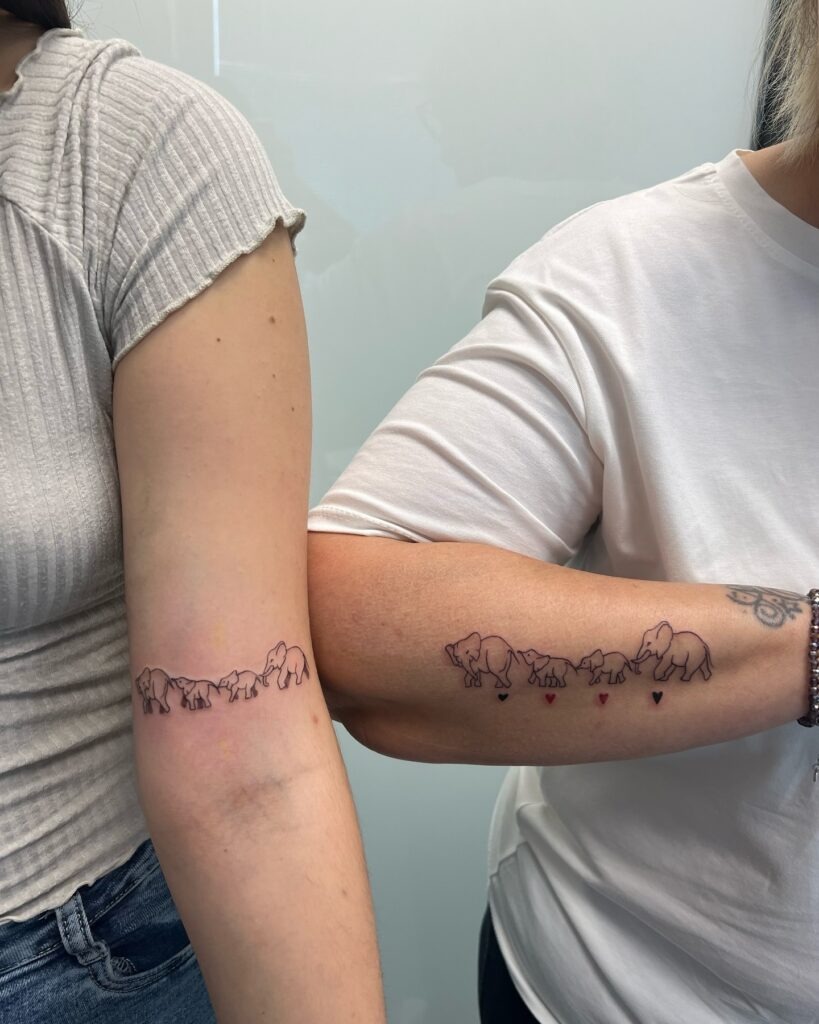 Matching Elephant Family Tattoos with Heart Trail Tattoo Design