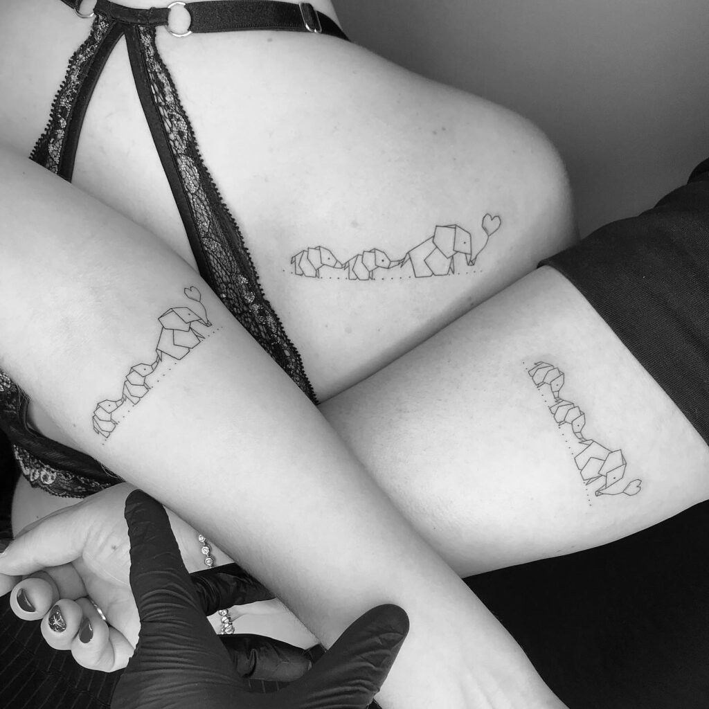 Matching Geometric Elephant Family Tattoos with Hearts Tattoo Design