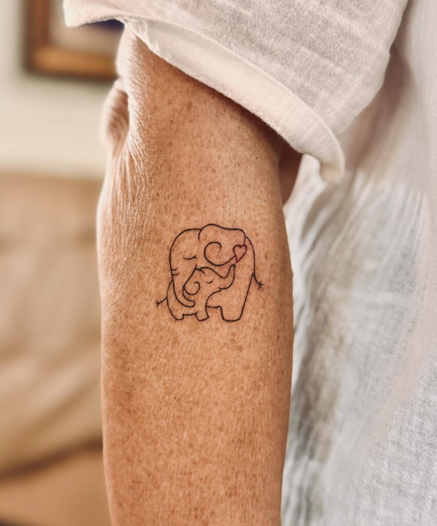 Minimalist Elephant and Calf Tattoo with Heart Tattoo Design