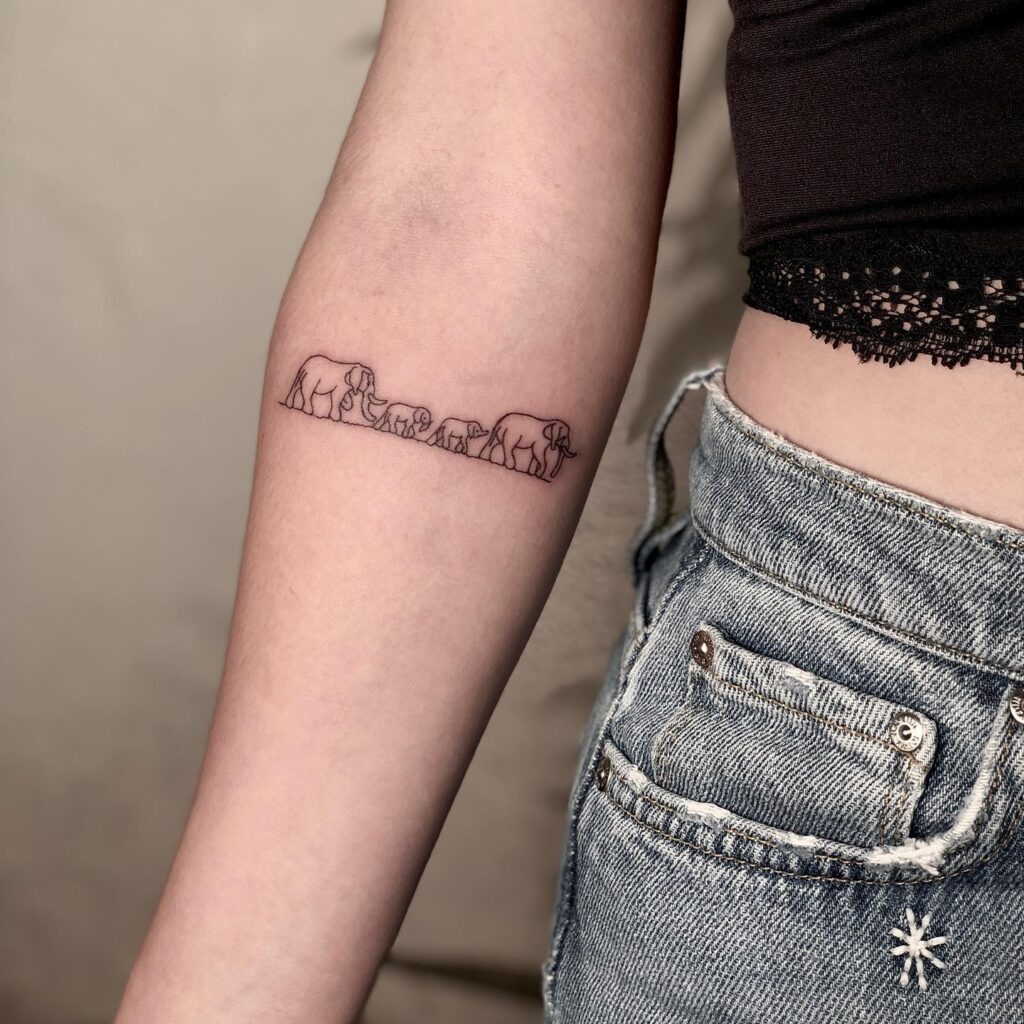 Minimalist Four-Elephant Family Tattoo Tattoo Design