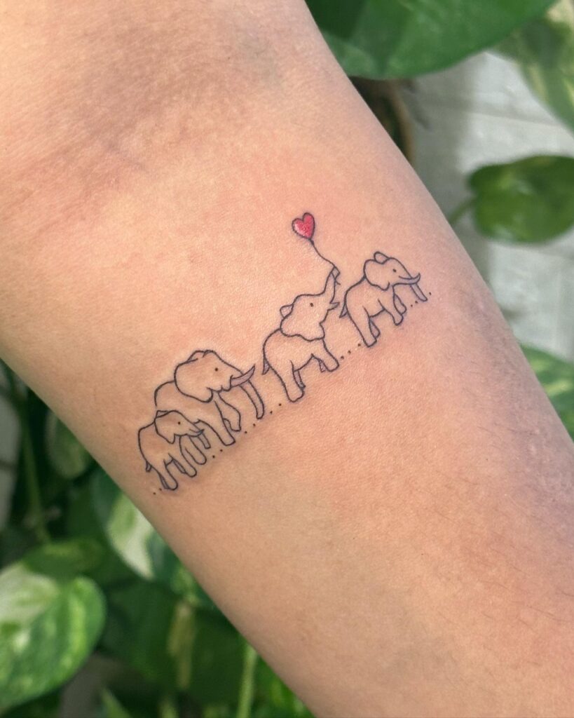Playful Four-Elephant Family Tattoo with Heart Tattoo Design