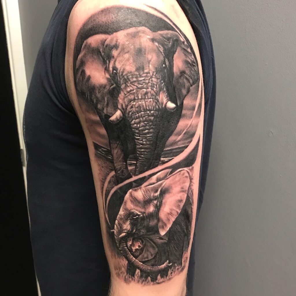 Realistic Elephant Family Arm Tattoo Tattoo Design