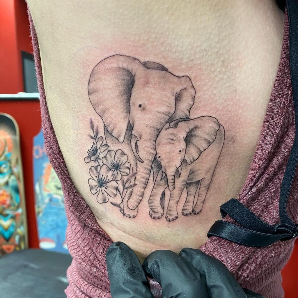 Side Elephant Tattoo with Floral Touch Tattoo Design