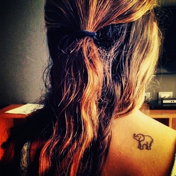 A baby elephant tattoo design on a ladies back Tattoo Design
