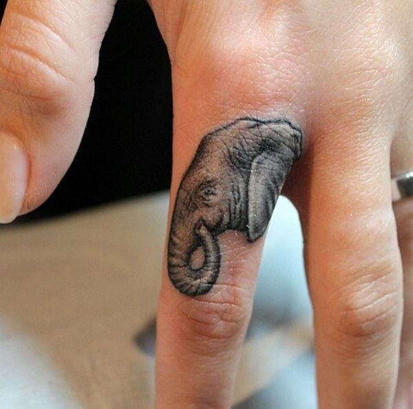 A baby elephant tattoo on the finger Tattoo Design