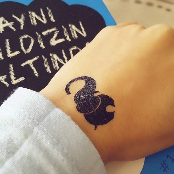 A beautiful and small elephant tattoo on the hand Tattoo Design