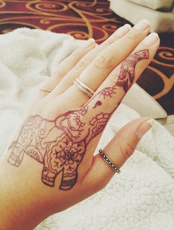 A beautiful mandala elephant tattoo on the hand and finger Tattoo Design