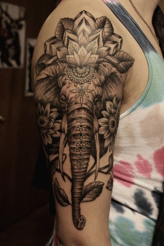 A big nicely decorated mandala elephant tattoo on the arm Tattoo Design