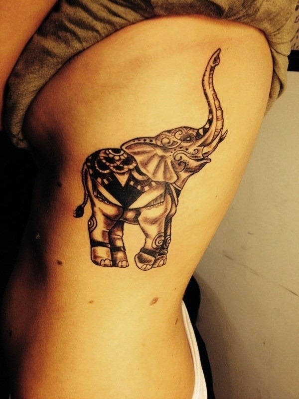A clothed elephant arm tattoo Tattoo Design