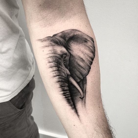 A half face fading elephant headwrist tattoo Tattoo Design