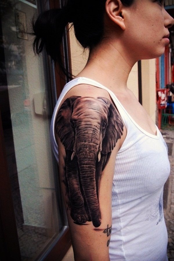 A huge and realistic elephant tattoo design on the shoulder Tattoo Design