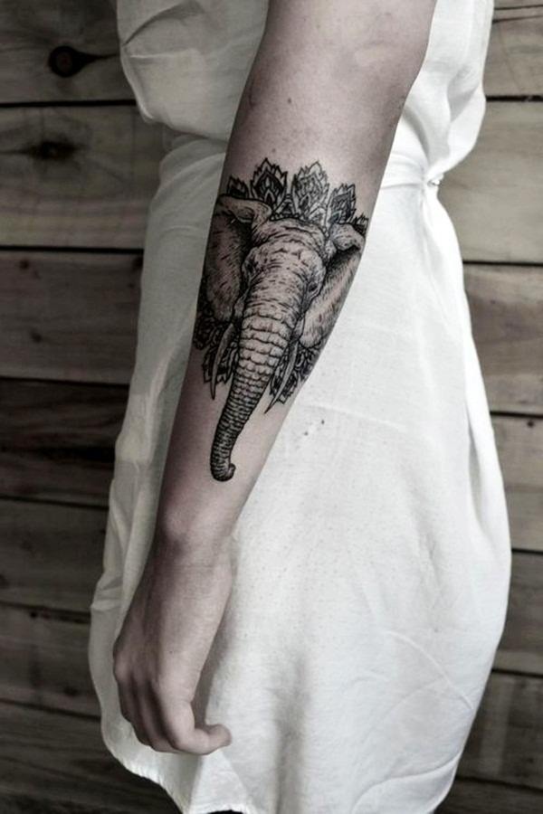 A large realistic elephant head tattoo on the wrist Tattoo Design
