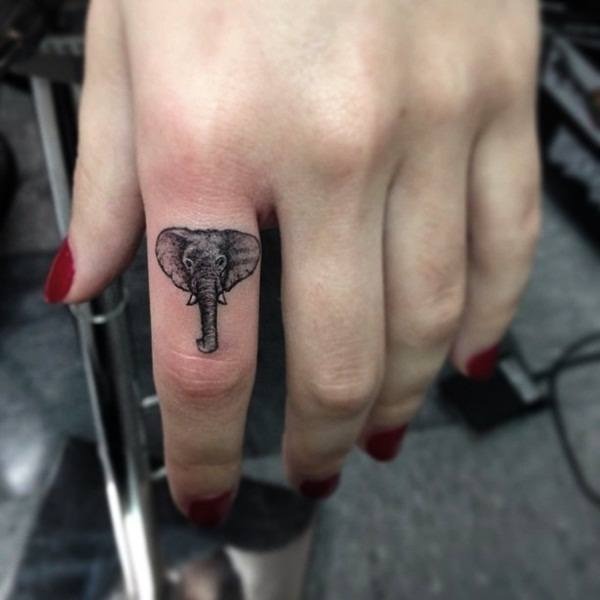 A simple elephant head tattoo on the finger Tattoo Design