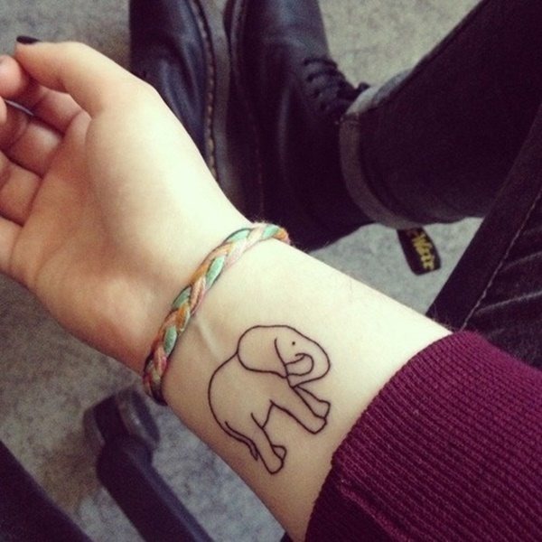 A simple elephant tattoo on the wrist Tattoo Design