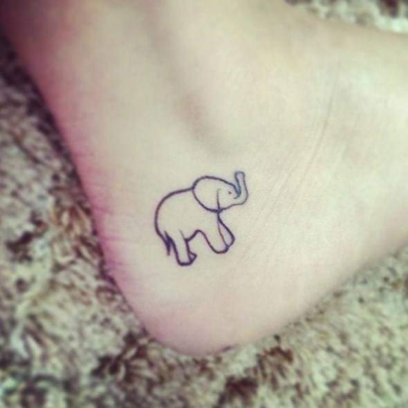A small elephant tattoo on the ankle Tattoo Design