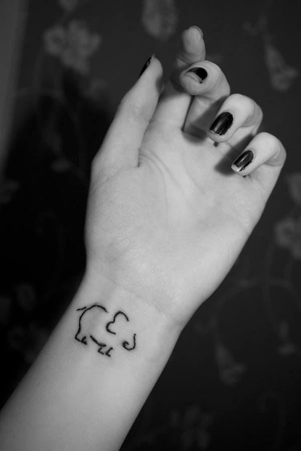A very simple elephant outline tattoo on the wrist Tattoo Design