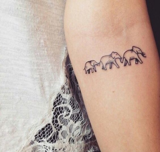 Elephant family tattoo on the arm Tattoo Design